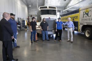 J. Alex Kelly and others visit PSC truck driving facility